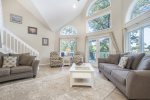 Living room has lots of seating and relaxing options